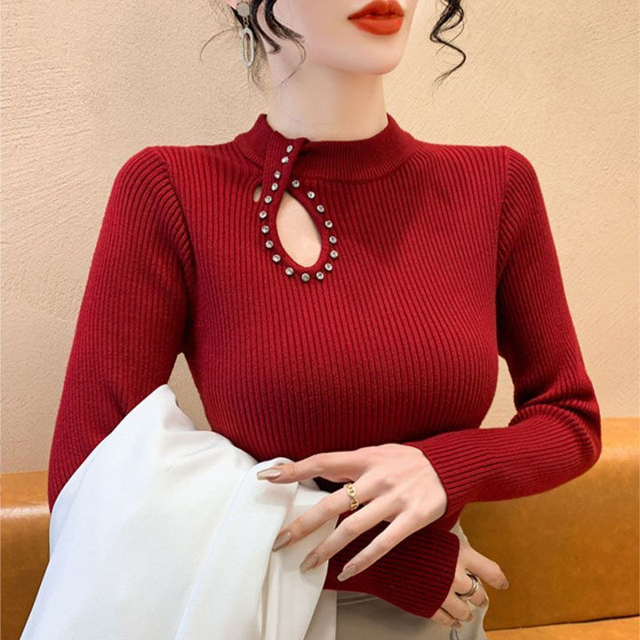 Chemise à manches longues pour femmes avec décolleté élégant et détails en bijoux Chic & Stil