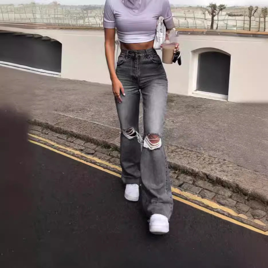 Ladies vintage flared jeans with stylish ripped details and high waistband Lune London