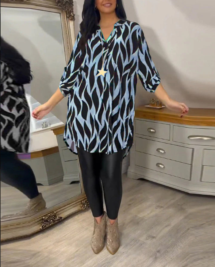 Robe blouse pour femmes avec un design graphique moderne et un ourlet asymétrique Chic & Stil
