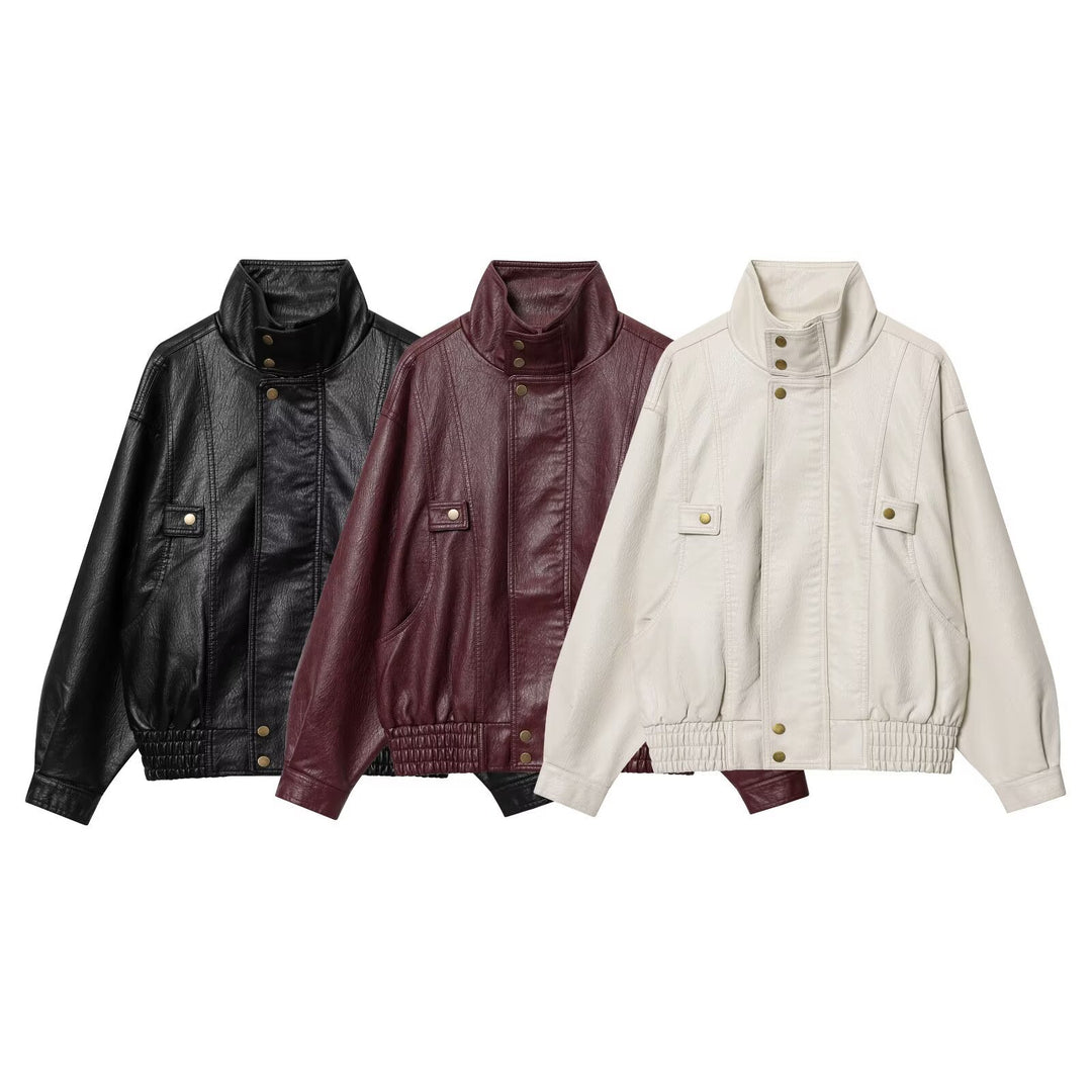 Women’s faux leather jacket with high collar and practical button details Lune London