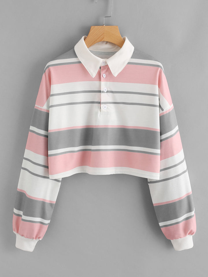 Women's polo shirt in a casual crop design with a stylish color block pattern Chic & Stil