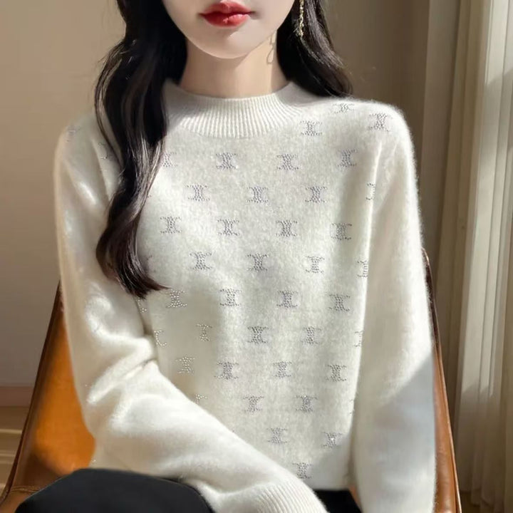 Sweater en tricot de luxe pour femmes avec un design en fine paillettes et encolure ronde Chic & Stil