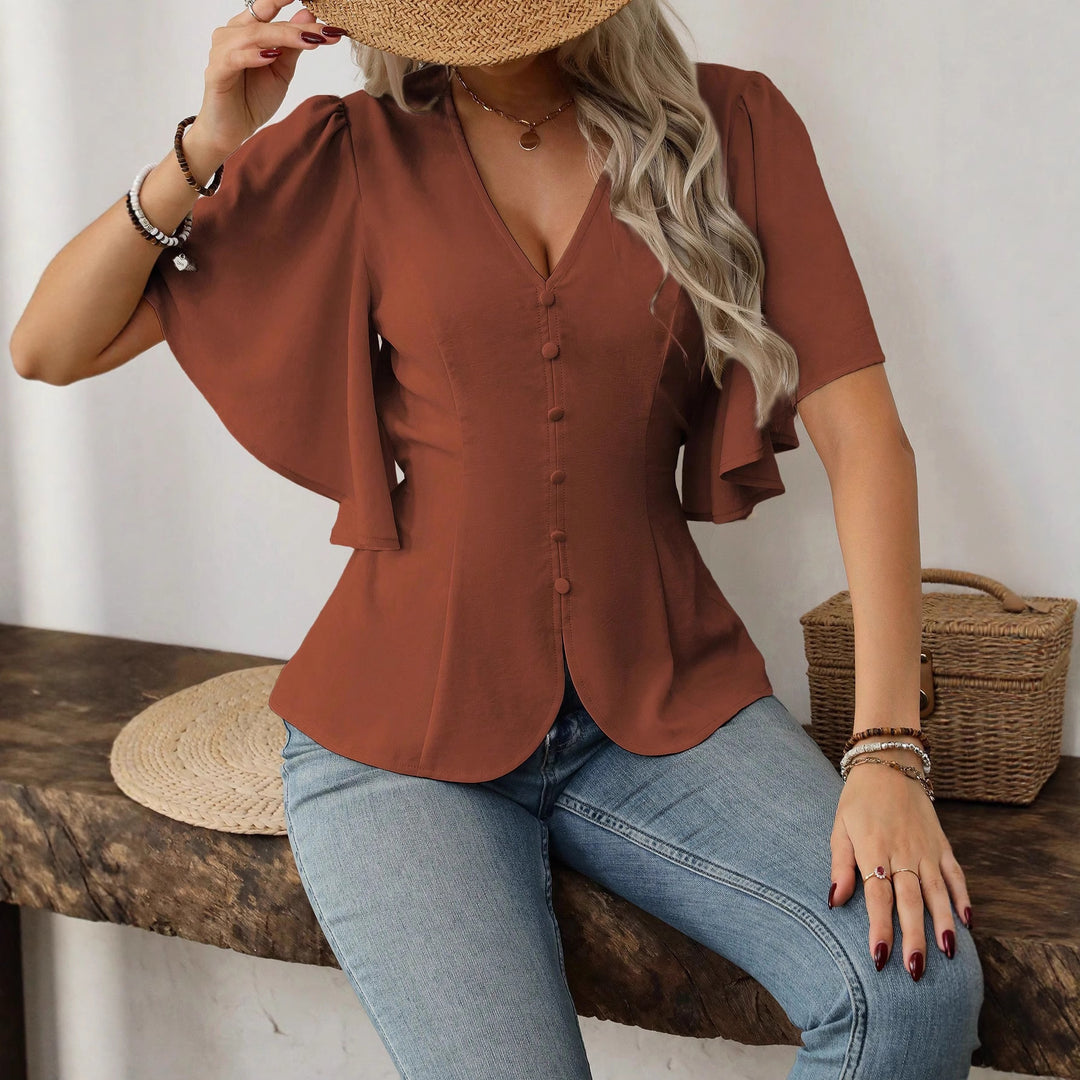 Women's elegant blouse with bell sleeves and button detail Lune London