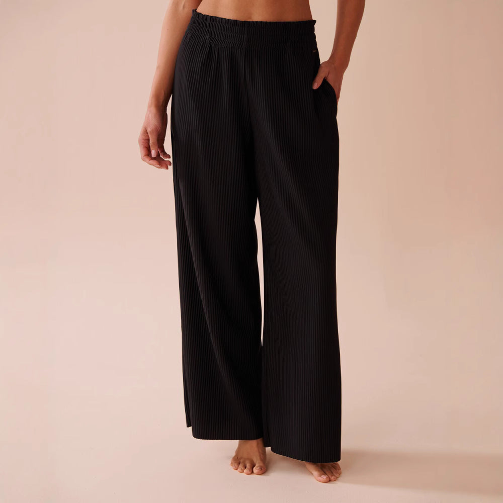 Wide pleated pants for women with elastic waistband and side pockets Lune London