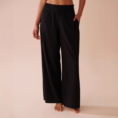 Wide pleated pants for women with elastic waistband and side pockets Lune London