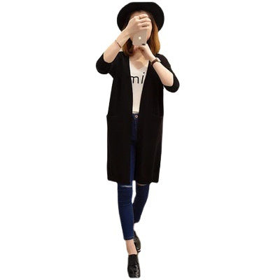 Long knitted cardigan for ladies with a relaxed fit and deep V-neck Lune London