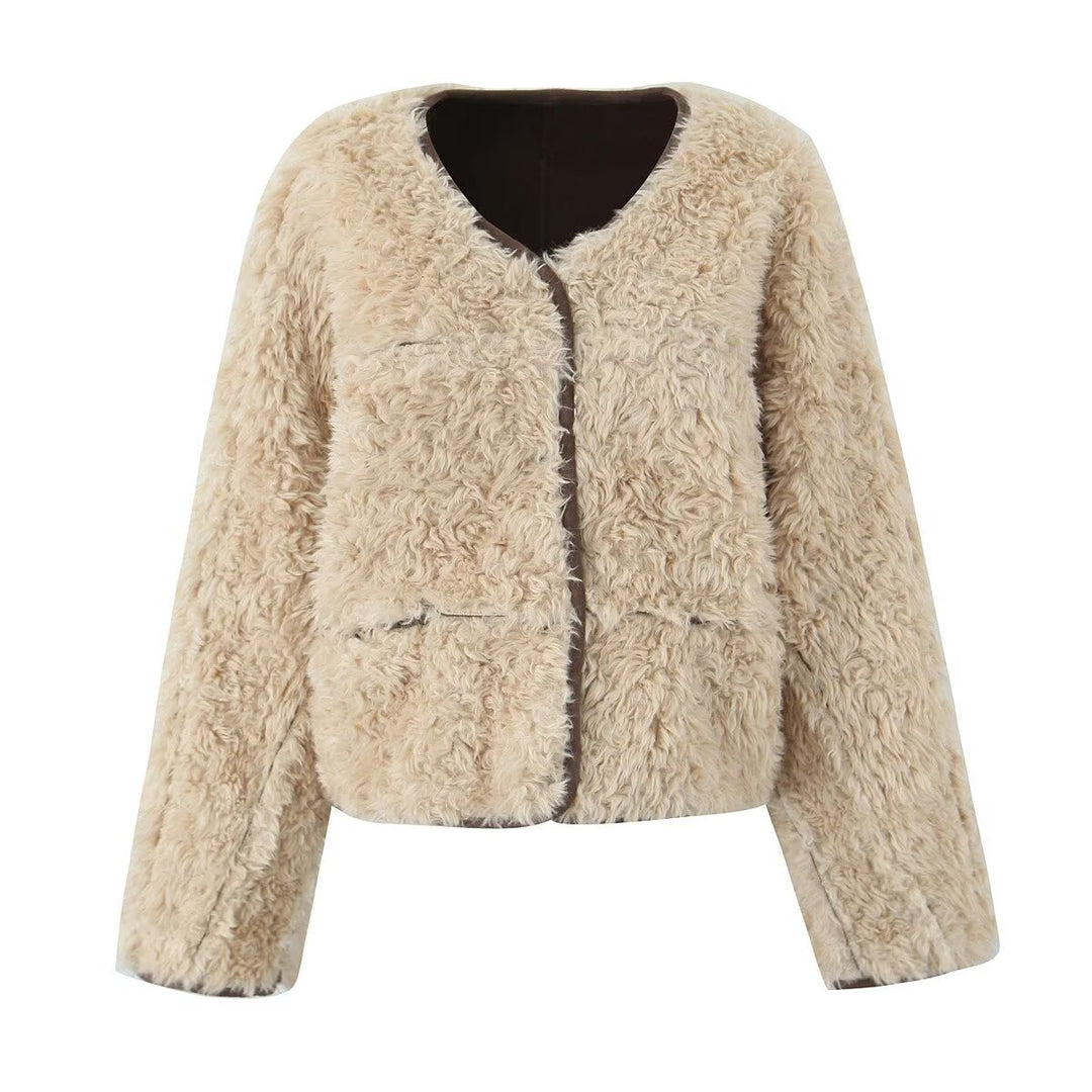 Ladies Fuzzy Short Jacket with a unique structure and a casual chic fit
