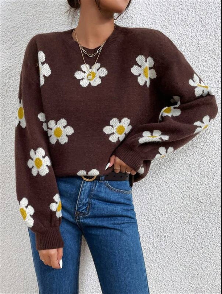 Knit sweater for women with a playful floral pattern and elegant puff sleeves Lune London
