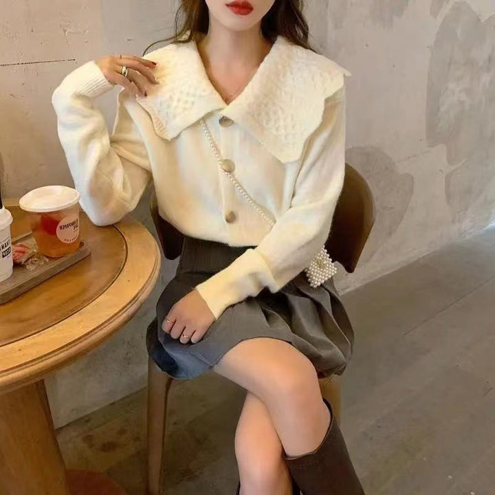 Knit jacket for women with wide collar and decorative buttons Lune London