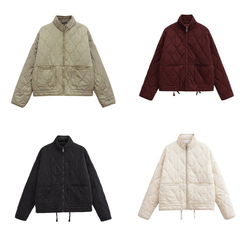 Ladies quilted transition jacket with high collar and practical pockets Lune London