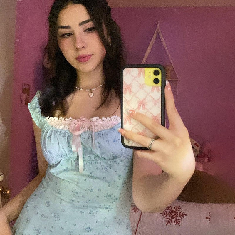Ladies nightdress with delicate lace decoration and playful ruffle elements