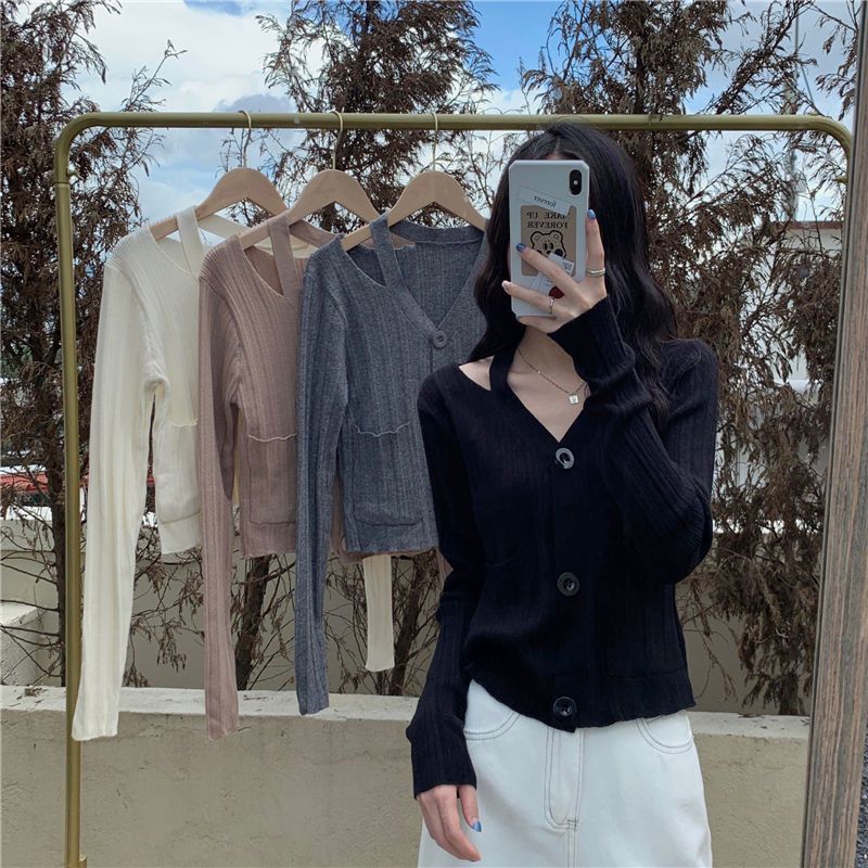 Cardigan élégant pour femmes avec col en V et poches Chic & Stil