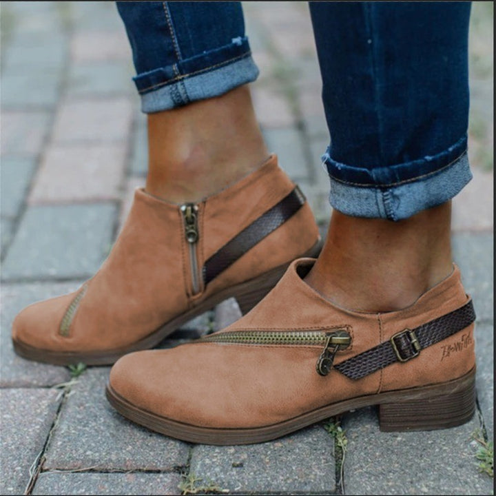 Elegant ankle boots for women with decorative zippers and a comfortable sole Lune London