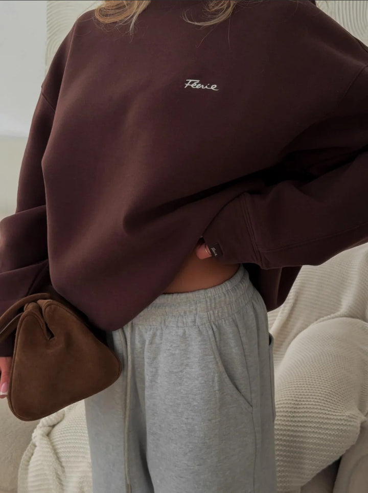Pull décontracté surdimensionné pour femmes avec col rond et logo discret Chic & Stil