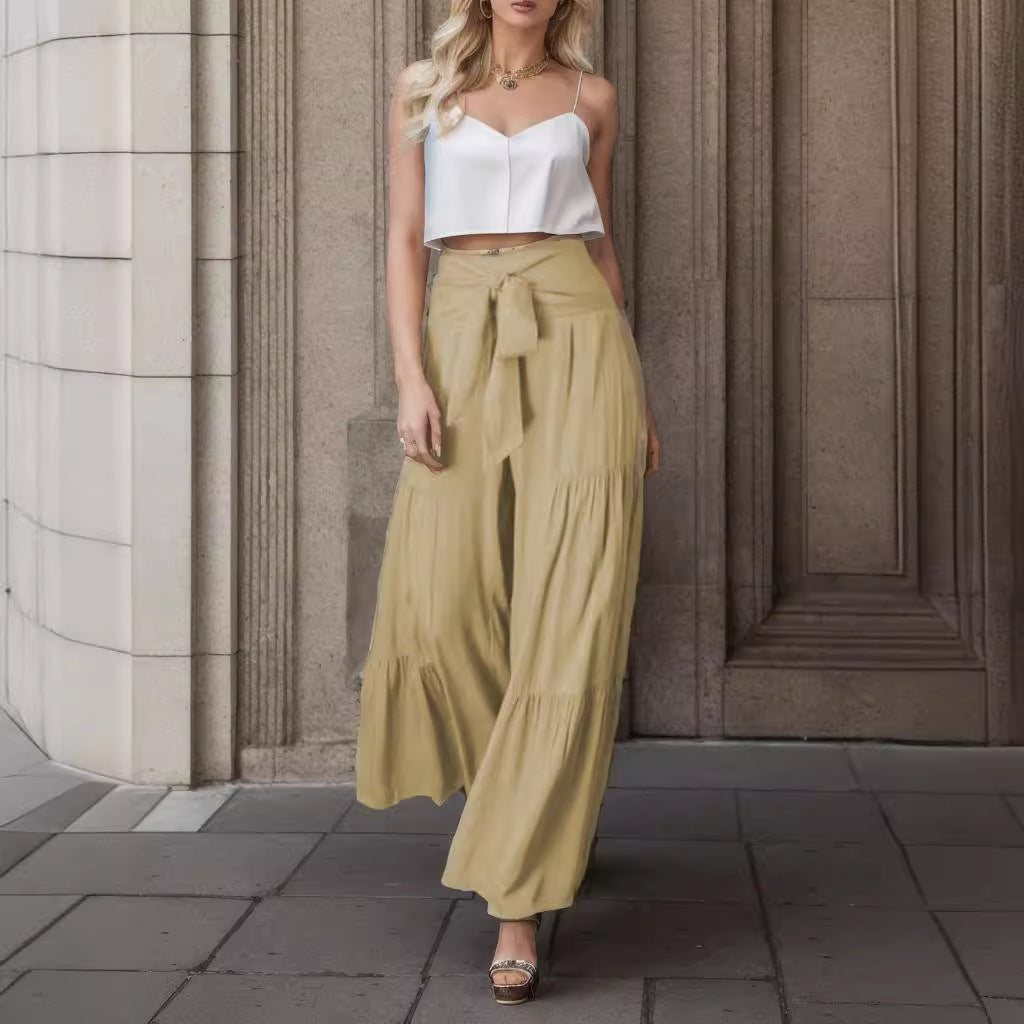 High-waisted wide trousers for women with elegant pleats and a tie belt Lune London