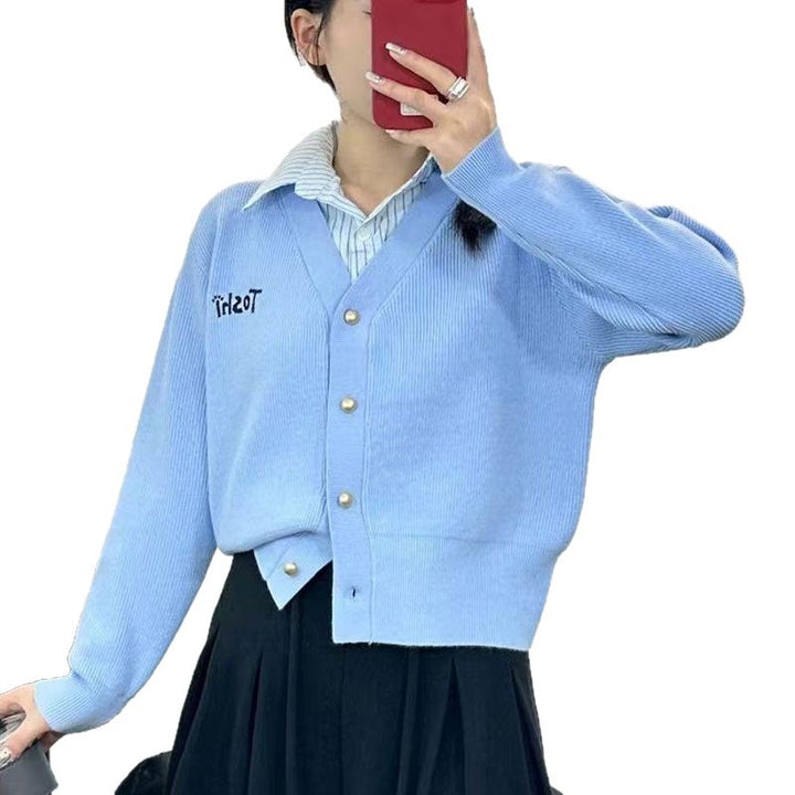 Femme cardigan décontracté avec col en V et boutons décoratifs Chic & Stil