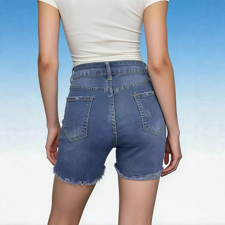 Women's casual high-waist denim shorts with fringe and trendy distressed details Lune London