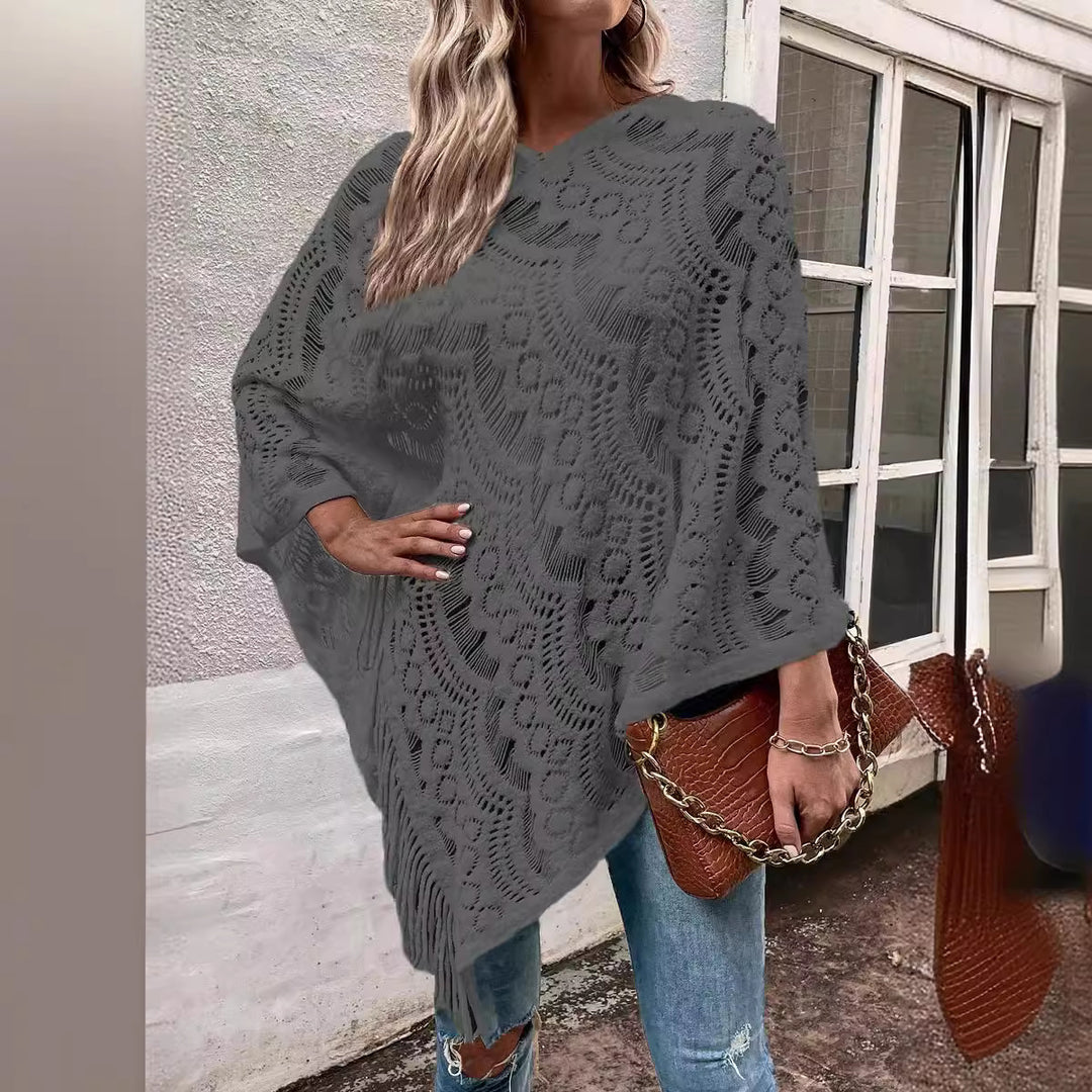 Ladies knitted poncho with chic and stylish fringed design