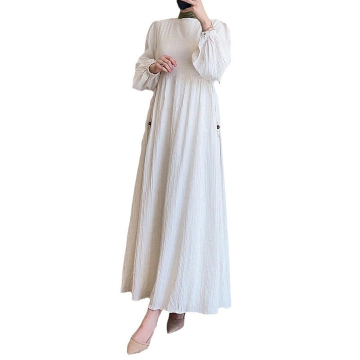 Maxi dress for women with an elegant pleated design and long puff sleeves Lune London