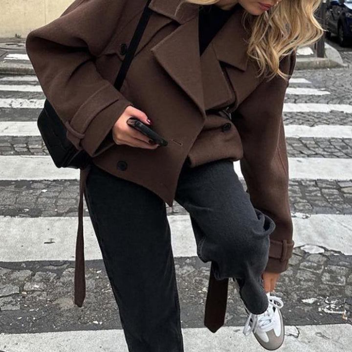 Lune London women's fashionable short trench coat with large flap pockets and a fitted cut