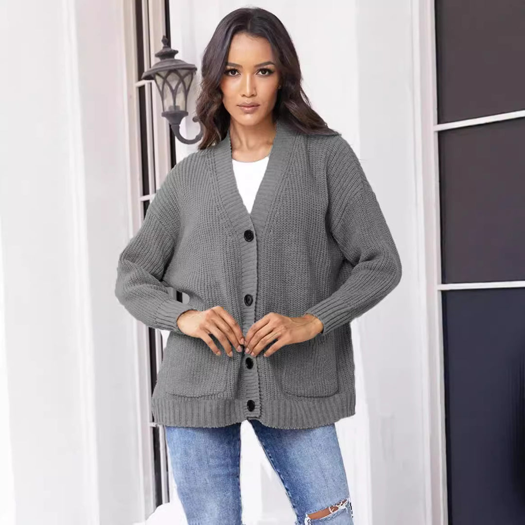 Ladies chunky knit cardigan with large pockets and modern button design Chic and Still
