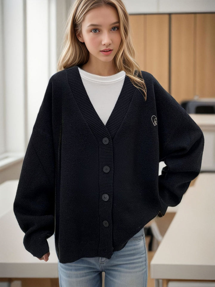 Ladies Chunky Knit Cardigan with oversized cut and decorative heart pattern Lune London