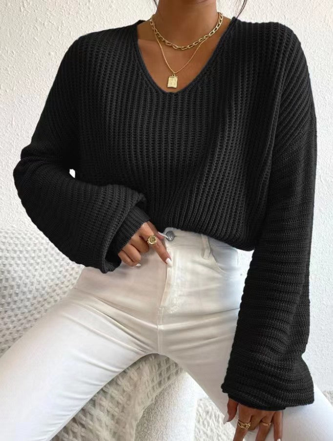Casual knit sweater for women with a wide V-neck and oversized sleeves Lune London
