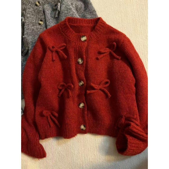 Cardigan pour femmes avec des nœuds décoratifs dessus
