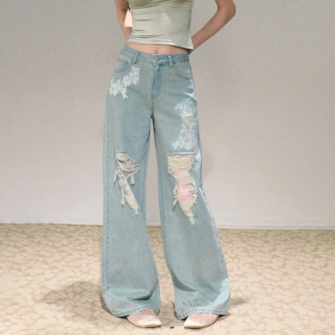 Women's wide cut jeans with individual destroyed details and floral print Lune London
