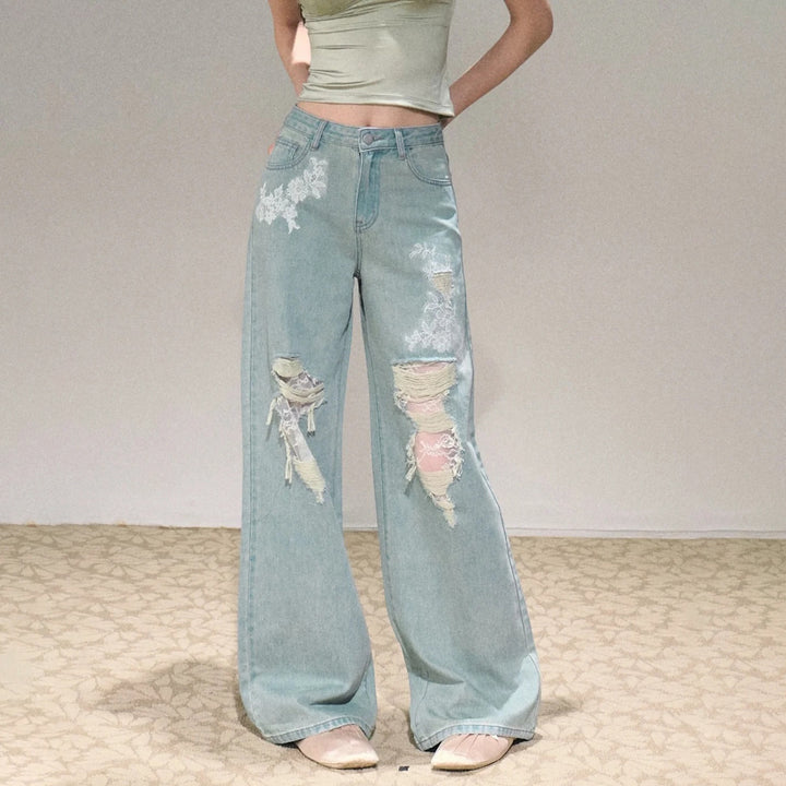 Women's wide cut jeans with individual destroyed details and floral print Lune London