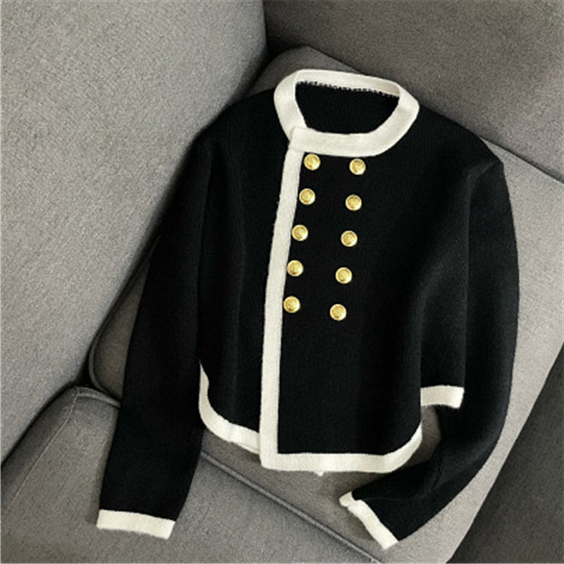 Elegant ladies cardigan with gold button details and contrasting finishes Lune London