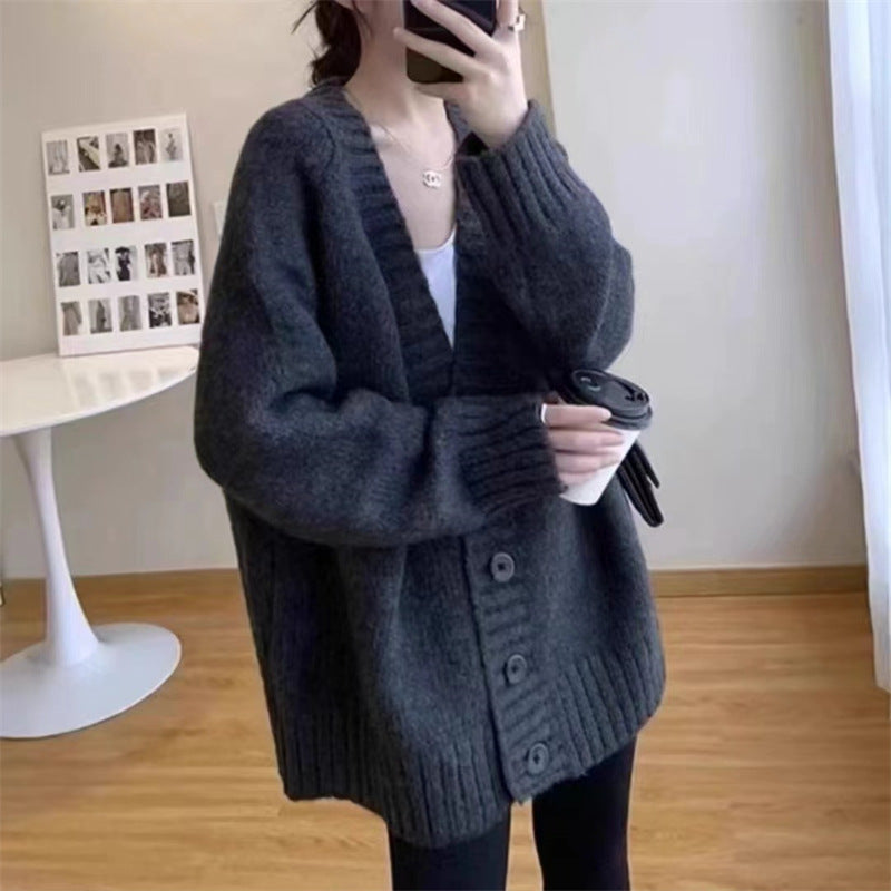 Ladies chunky knit cardigan with voluminous sleeves and buttoned neckline Lune London