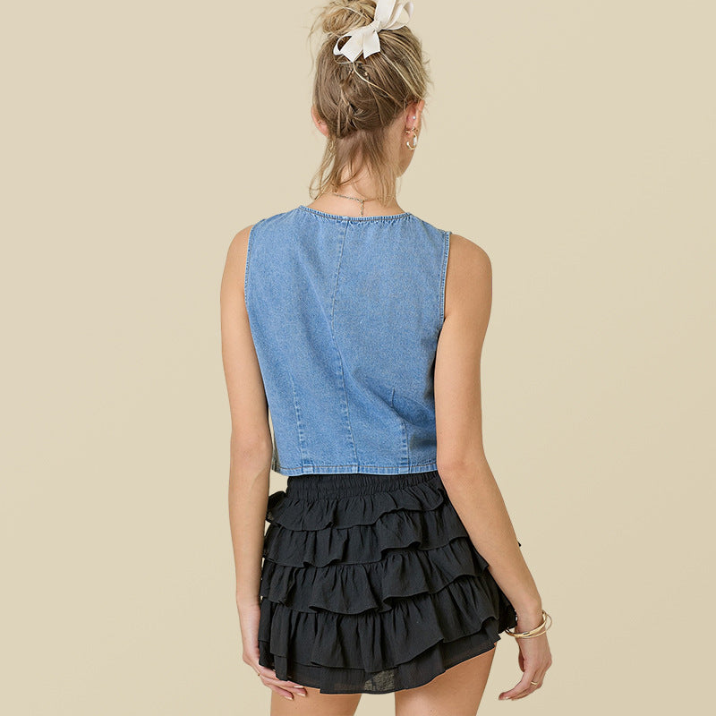 Women's denim shirt vest with playful lacing details and modern cut