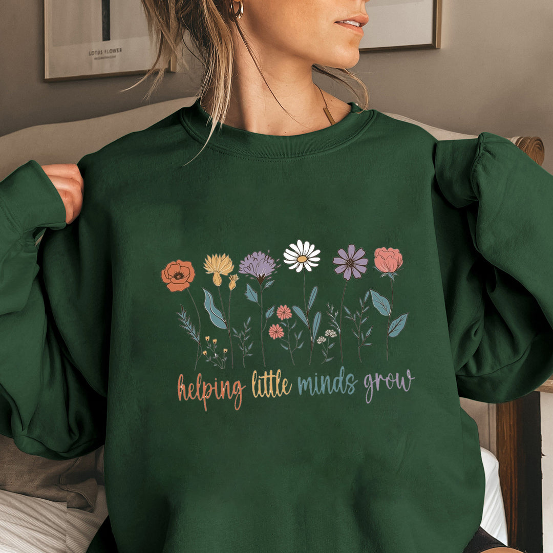 Sweat-shirt femme avec des manches volumineuses et un imprimé floral motivant Chic & Stil