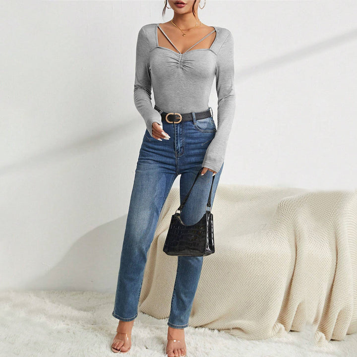 Body à manches longues pour femmes avec un décolleté en V à la mode et des détails sophistiqués sur les épaules Chic & Stil