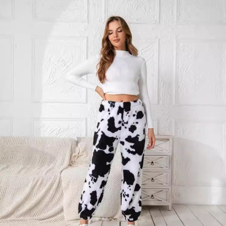 Soft leisure pants for women with a unique cow pattern Lune London