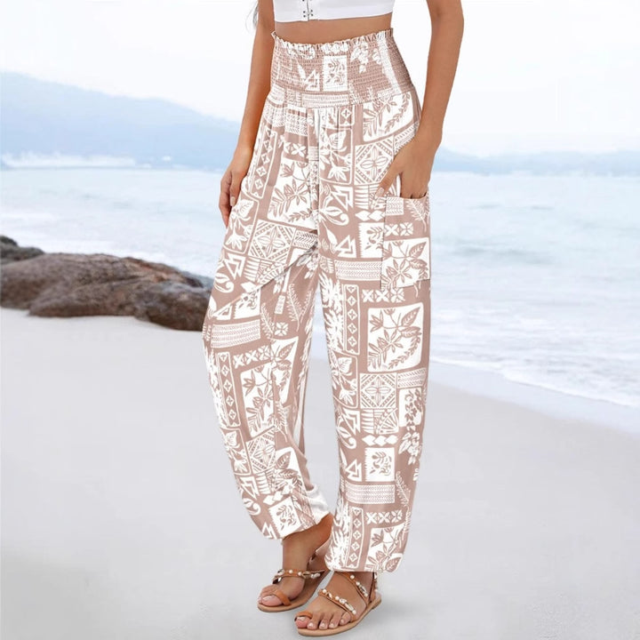 Wide Palazzo pants for women with colorful Paisley pattern and elastic waistband Lune London