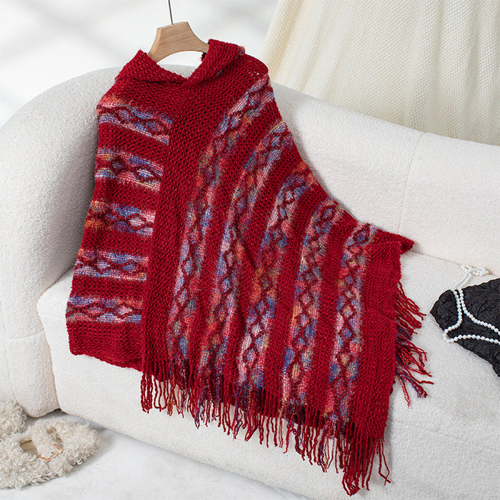 Ladies knitted poncho with hood and fringe design Lune London