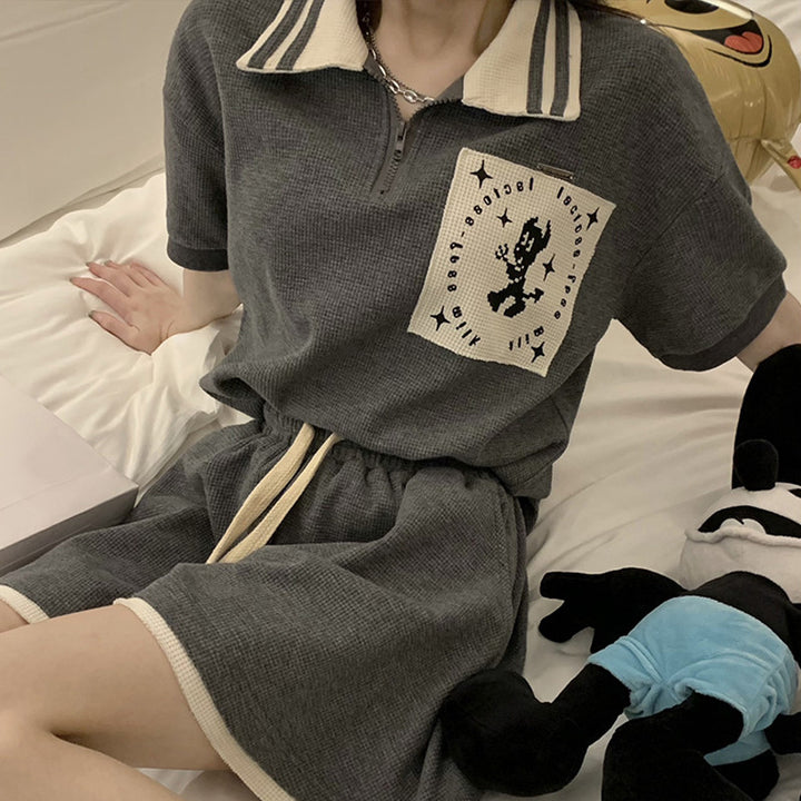 Women's Short Sleeve Polo Shirt with Modern Collar and Stylish Graphic Detail Lune London