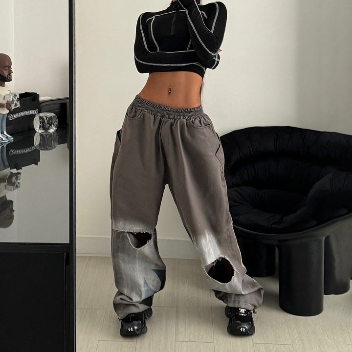 Casual women's pants with an oversized relaxed fit and trendy tear details Lune London