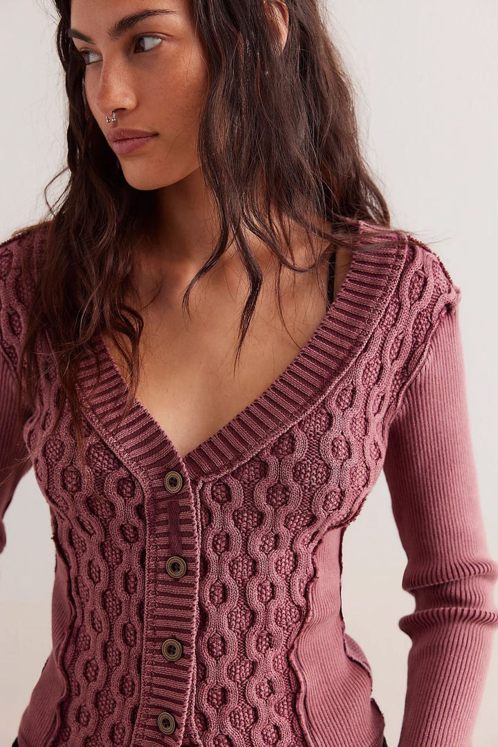 Women's knit jacket with elaborate twisted details and button placket Lune London