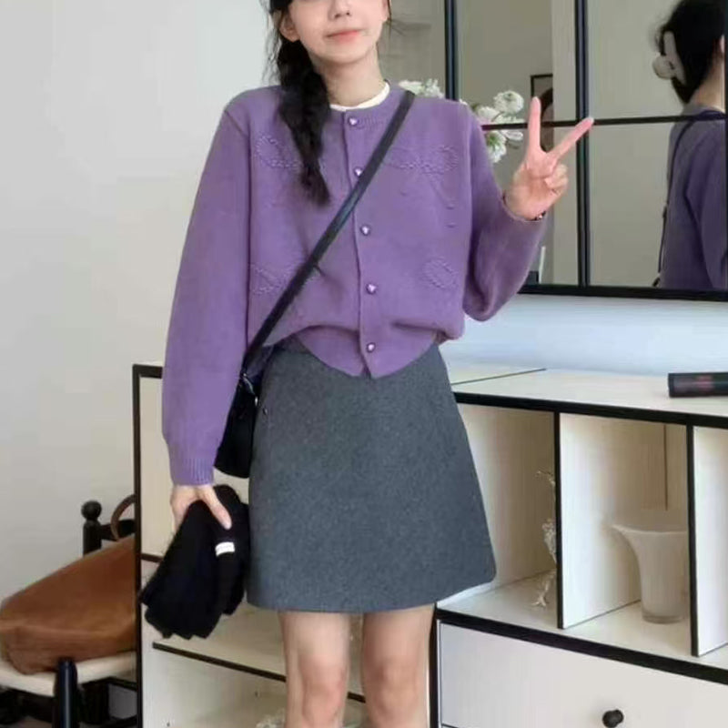 Ladies comfortable short sleeve knitted cardigan with high quality button details Lune London