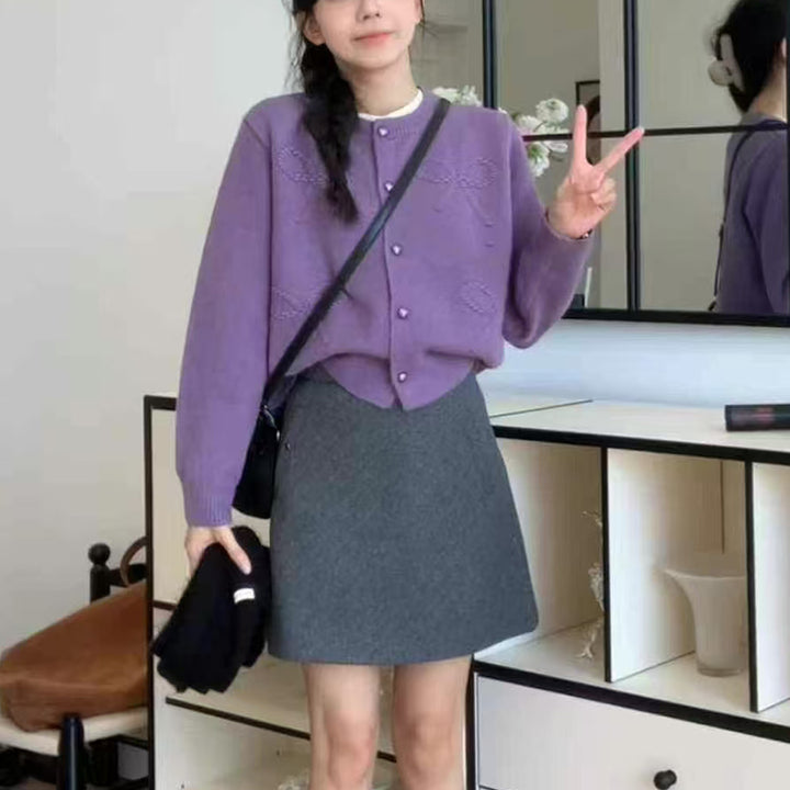 Ladies comfortable short sleeve knitted cardigan with high quality button details Lune London
