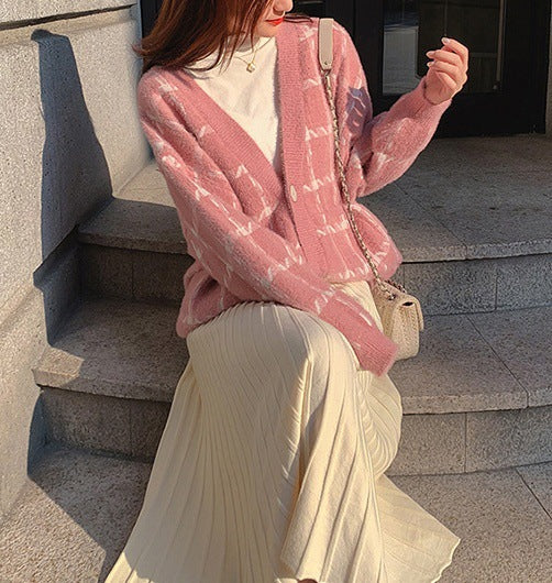 Ladies oversized cozy wool sweater with chic check pattern and style