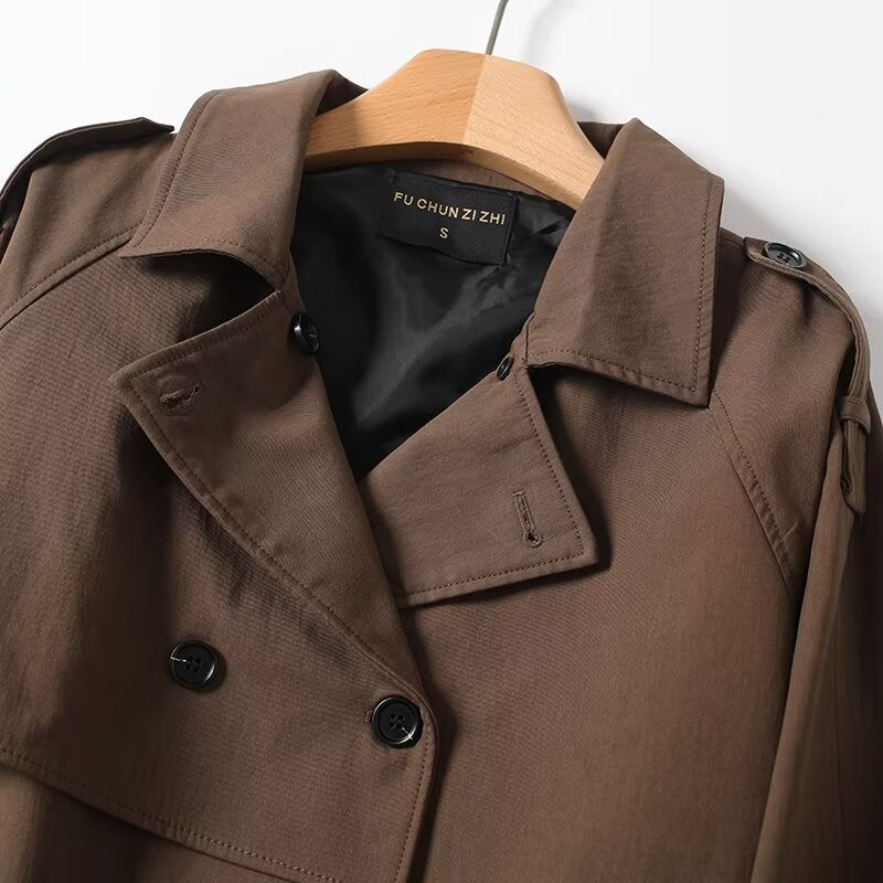 Trendy oversized trench coat for women with double-breasted closure and tie belt Lune London