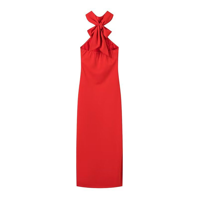 Maxi dress for women with a playful halter neck and an elegant bow. Lune London