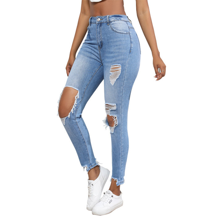 High-waisted women's jeans with ripped and fringed details Lune London