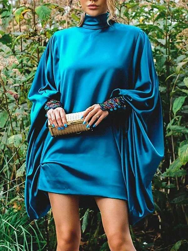 Oversized mini dress for women with voluminous sleeves and an elegant high collar Lune London