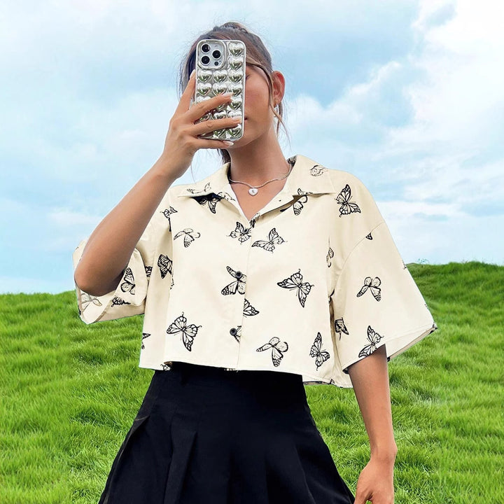 Short sleeve button-up shirt butterfly print Lune London