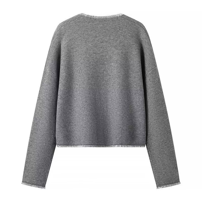 Pull en tricot épais pour femmes avec col en V profond et poches pratiques Chic & Stil